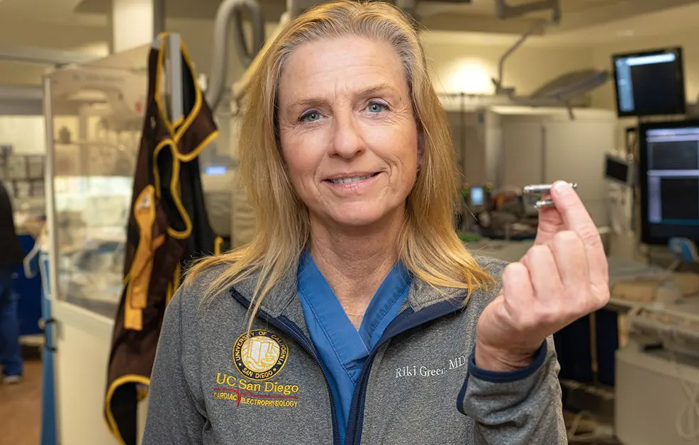 UC San Diego Health is the first in San Diego to successfully implant the world’s first dual chamber and leadless pacemaker system to help treat people with abnormal heart rhythms. Holding the device and pictured above is Ulrika Birgersdotter-Green, MD, cardiologist and director of pacemaker and ICD services at UC San Diego Health. Photo credit: Kyle Dykes | UC San Diego Health