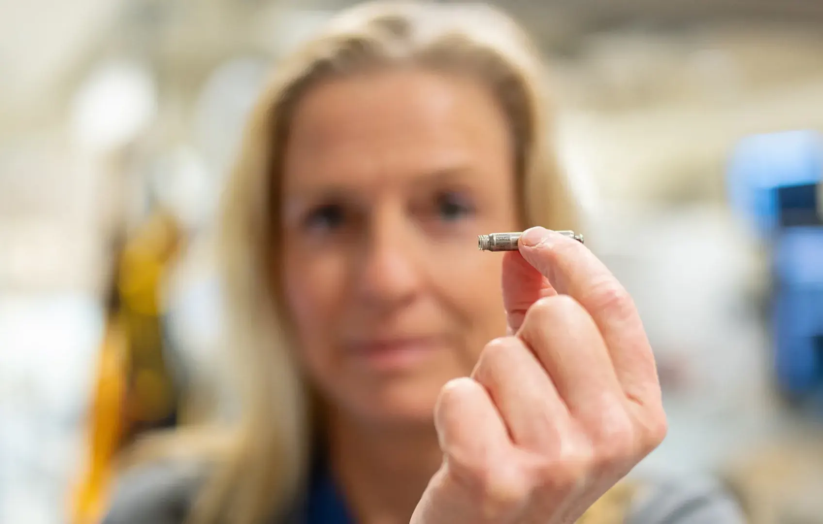 Cardiologist Ulrika Birgersdotter-Green, MD, shows the size of a leadless pacemaker in the Electrophysiology Lab at Sulpizio Cardiovascular Center. Photo credit: Kyle Dykes, UC San Diego Health